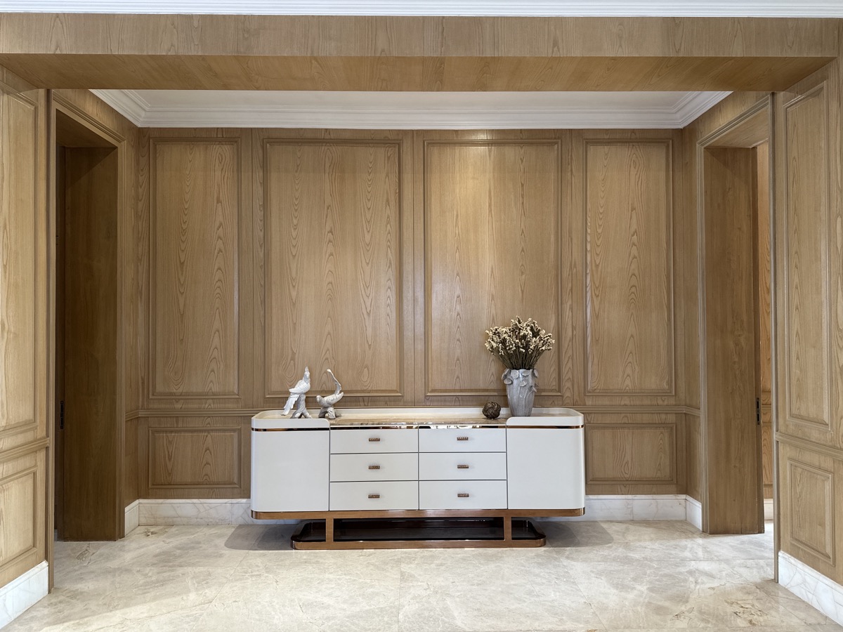 Custom crockery unit and console against a warm timber wall