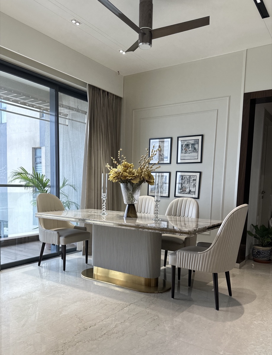 Custom dining table and chairs in a contemporary Kolkata home